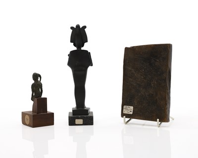Lot 237 - An Ancient Egyptian bronze statuette of a god