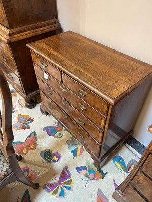 Lot 157 - A George I and later walnut chest of drawers