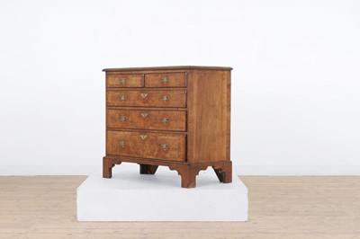 Lot 157 - A George I and later walnut chest of drawers