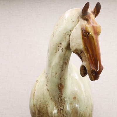 Lot 8 - A Chinese sancai-glazed pottery horse