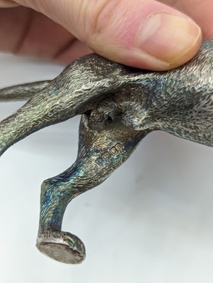 Lot 37 - A cast silver model of a labrador
