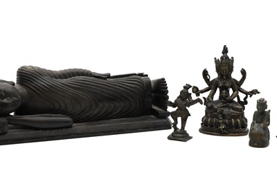 Lot 236 - A group of nine bronze buddha and other deities