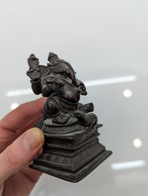Lot 236 - A group of nine bronze buddha and other deities