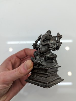 Lot 236 - A group of nine bronze buddha and other deities