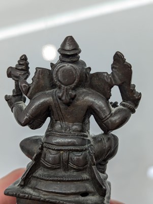 Lot 236 - A group of nine bronze buddha and other deities