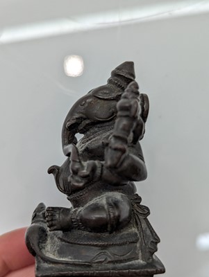 Lot 236 - A group of nine bronze buddha and other deities