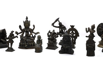 Lot 236 - A group of nine bronze buddha and other deities