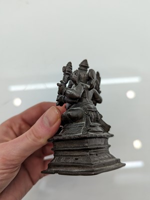 Lot 236 - A group of nine bronze buddha and other deities