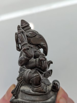 Lot 236 - A group of nine bronze buddha and other deities