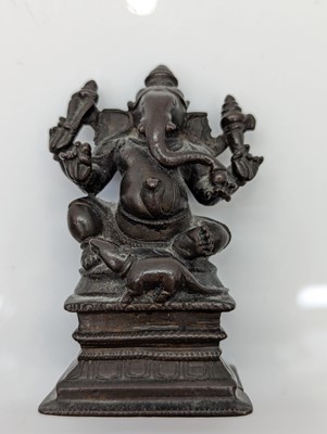 Lot 236 - A group of nine bronze buddha and other deities