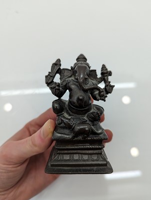 Lot 236 - A group of nine bronze buddha and other deities