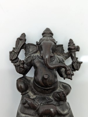 Lot 236 - A group of nine bronze buddha and other deities