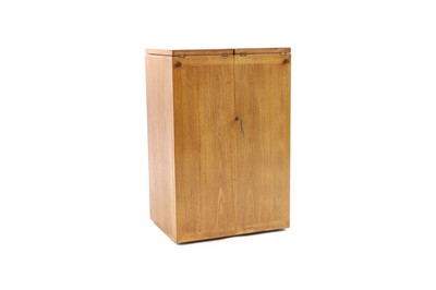 Lot 419 - A Heals folding drinks cabinet