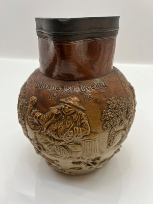 Lot 142 - A group of four salt glazed stoneware 'Harvest' jugs