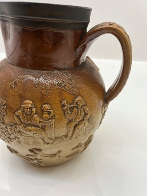 Lot 142 - A group of four salt glazed stoneware 'Harvest' jugs