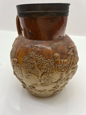 Lot 142 - A group of four salt glazed stoneware 'Harvest' jugs
