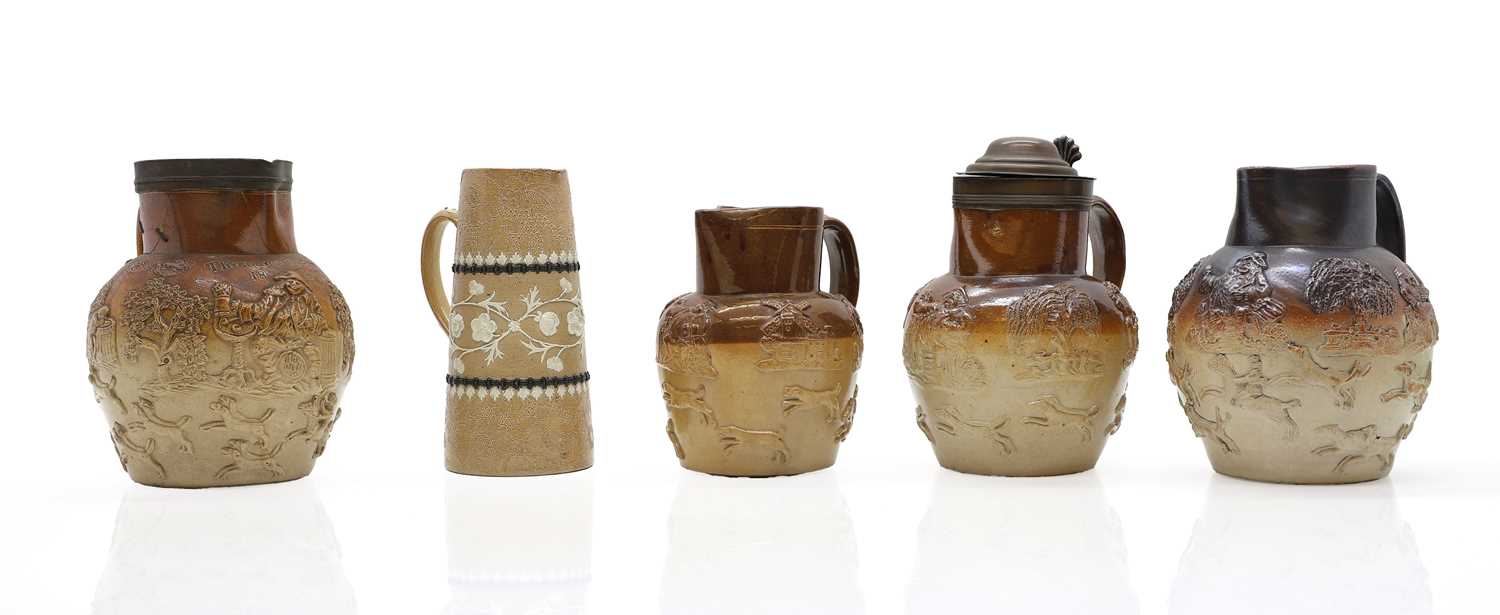 Lot 142 - A group of four salt glazed stoneware 'Harvest' jugs