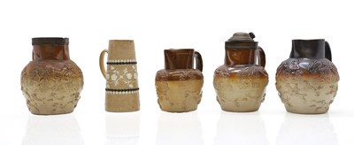 Lot 142 - A group of four salt glazed stoneware 'Harvest' jugs