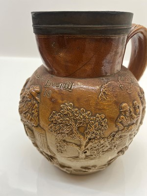 Lot 142 - A group of four salt glazed stoneware 'Harvest' jugs