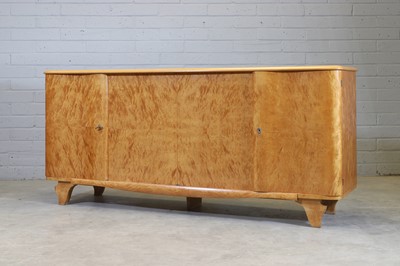 Lot 49 - A North European Art Deco flame birch commode