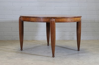 Lot 67 - A French Art Deco walnut and mahogany dining table
