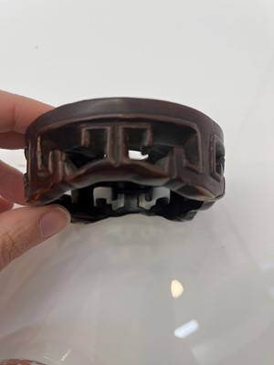 Lot 73 - A Chinese iron red water pot