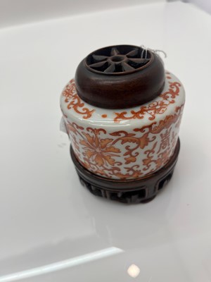 Lot 73 - A Chinese iron red water pot
