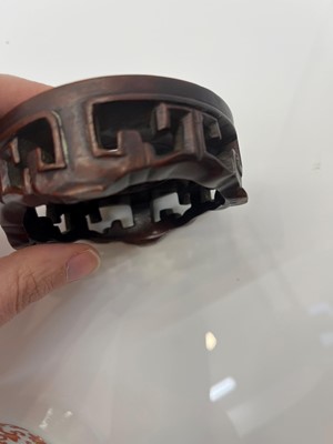 Lot 73 - A Chinese iron red water pot