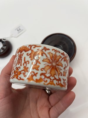 Lot 73 - A Chinese iron red water pot