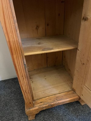 Lot 81 - A pair of pitch pine bedside cabinets