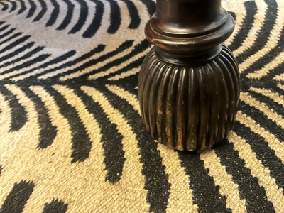 Lot 63 - A stained wood and zebra skin stool