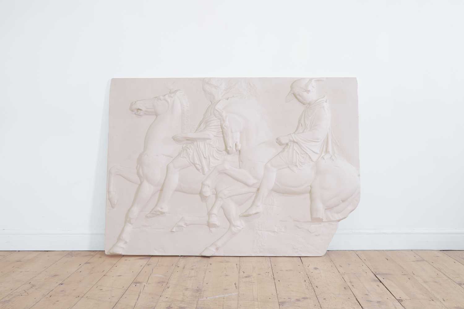 Lot 36 - An imitation marble relief panel after the antique