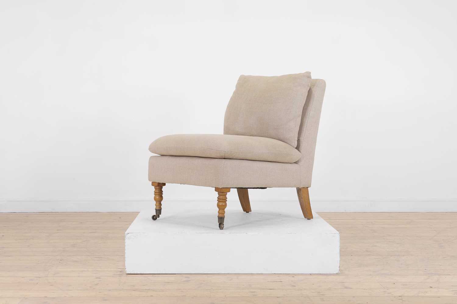 Lot 7 - An upholstered nursing chair by OKA