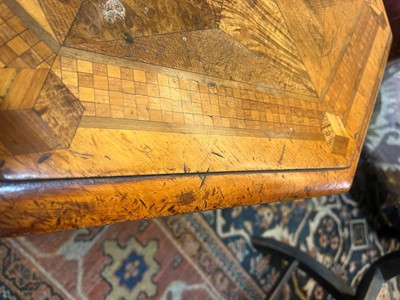 Lot 65 - A Victorian walnut and specimen wood occasional table in the manner of Gillows