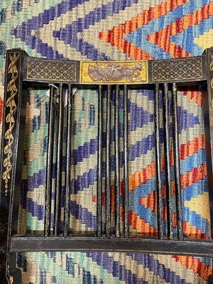 Lot 66 - A pair of George III ebonised and painted wooden side chairs