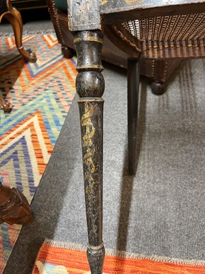 Lot 66 - A pair of George III ebonised and painted wooden side chairs