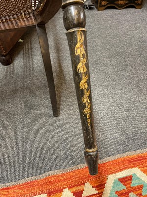 Lot 66 - A pair of George III ebonised and painted wooden side chairs