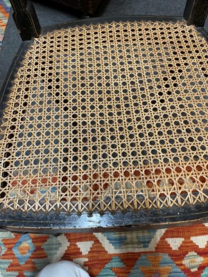 Lot 66 - A pair of George III ebonised and painted wooden side chairs
