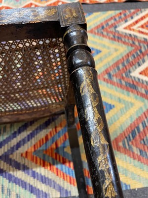 Lot 66 - A pair of George III ebonised and painted wooden side chairs