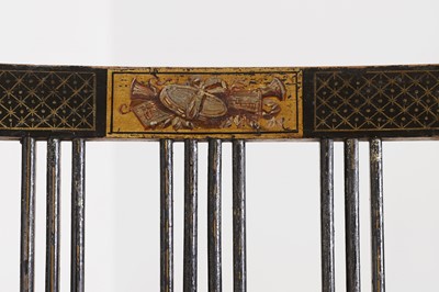 Lot 66 - A pair of George III ebonised and painted wooden side chairs