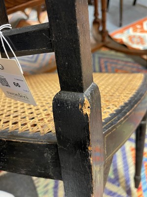 Lot 66 - A pair of George III ebonised and painted wooden side chairs