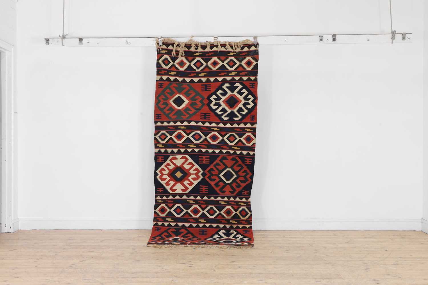 Lot 86 - A kilim flat-weave runner