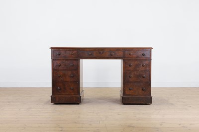 Lot 87 - A Victorian walnut twin-pedestal desk