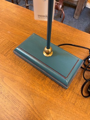 Lot 10 - A pair of Art Deco style toleware table lamps by OKA