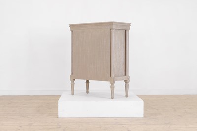 Lot 24 - A painted wooden and verre églomisé chest of drawers by OKA