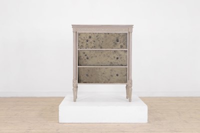 Lot 24 - A painted wooden and verre églomisé chest of drawers by OKA