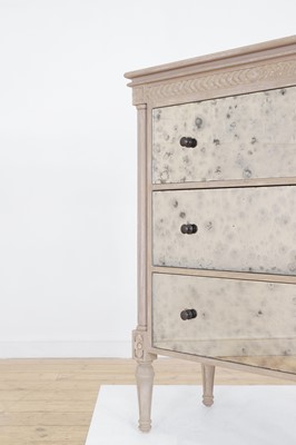 Lot 24 - A painted wooden and verre églomisé chest of drawers by OKA