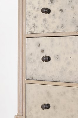Lot 24 - A painted wooden and verre églomisé chest of drawers by OKA