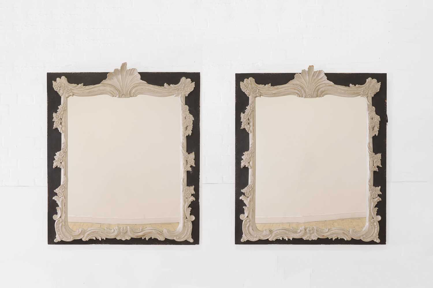 Lot 45 - A pair of painted wooden wall mirrors