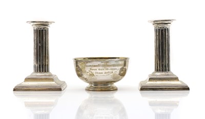 Lot 33 - A pair of silver candlesticks